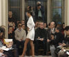 Models wear shell-embellished garments at the Prada Spring/Summer 1991 womenswear show in Milan. Video via Pradasphere