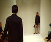 Model Kate Moss wears a black version of the jacket for the Prada Fall/Winter 1995 womenswear show in Milan. Video via Prada.com