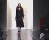A model wears a black degradé version of the skirt for the Prada Fall/Winter 2007 womenswear show in Milan. Video via Canale Moda